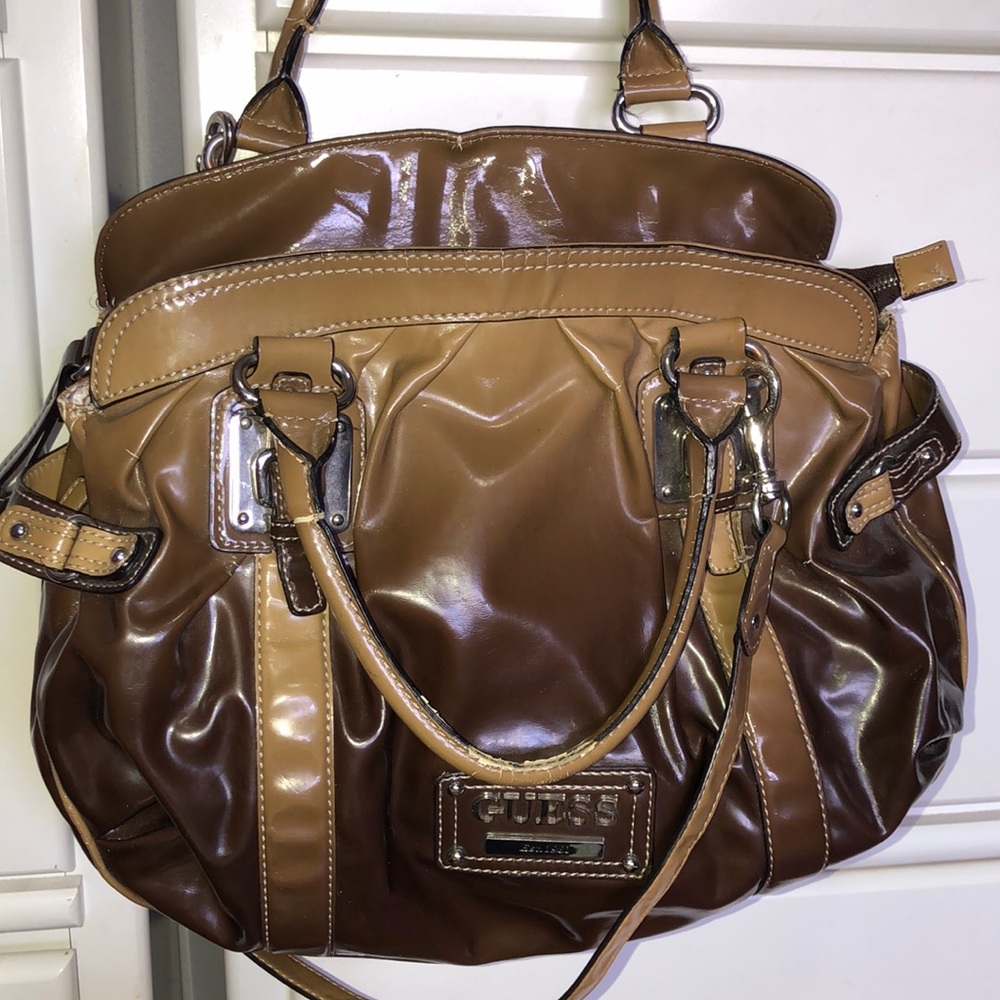 Diaper duffle bag, brown and tanned. Worn.
